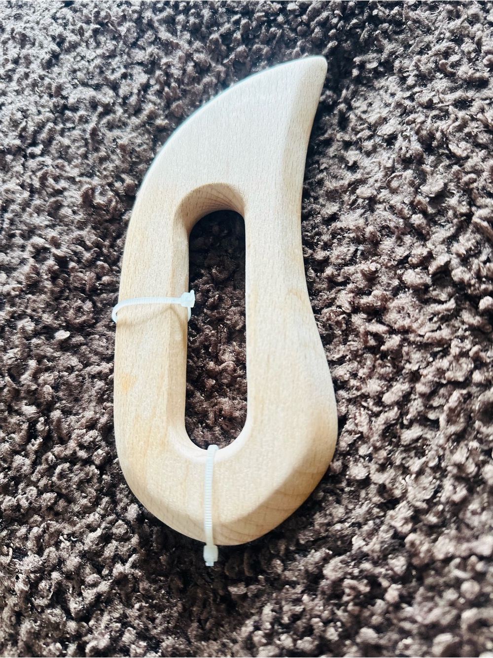 Wooden Handheld Shuttle Tool in Natural Wood Tone